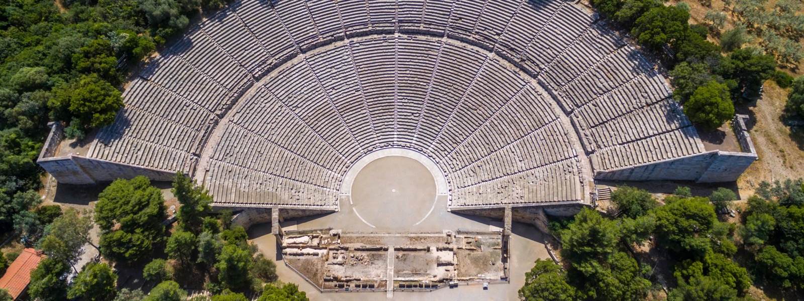 The sweeping stone seating of the Ancient Theatre of Epidaurus